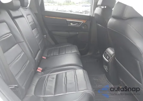 2021 Honda Cr-V Awd Touring z USA, uszkodzony, nr VIN 7FARW2H92ME001201